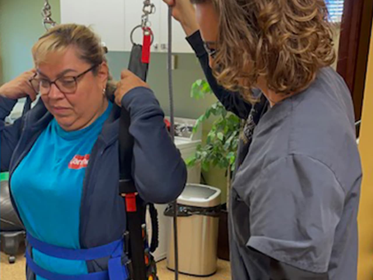 Client getting physical therapy using an unweighing system