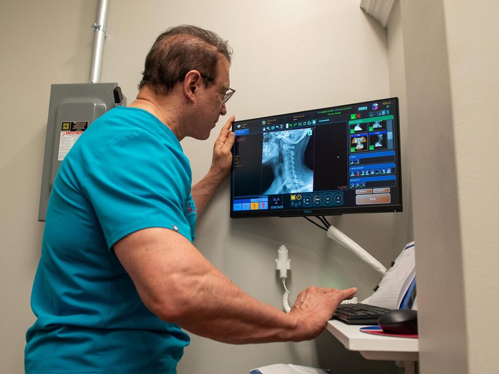 Dr. Kelly reviewing an x-ray result