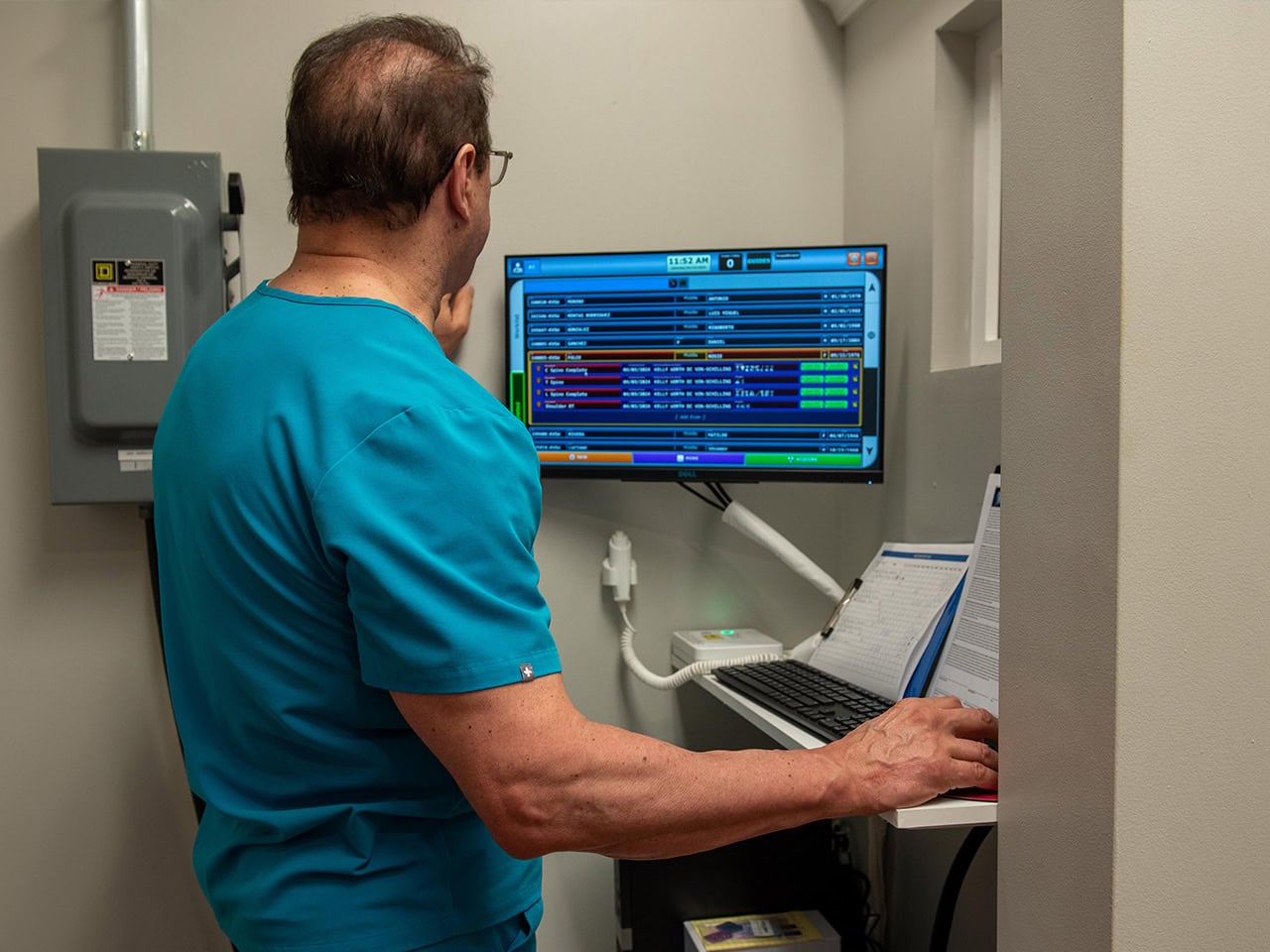 Dr. Kelly diagnosing patient