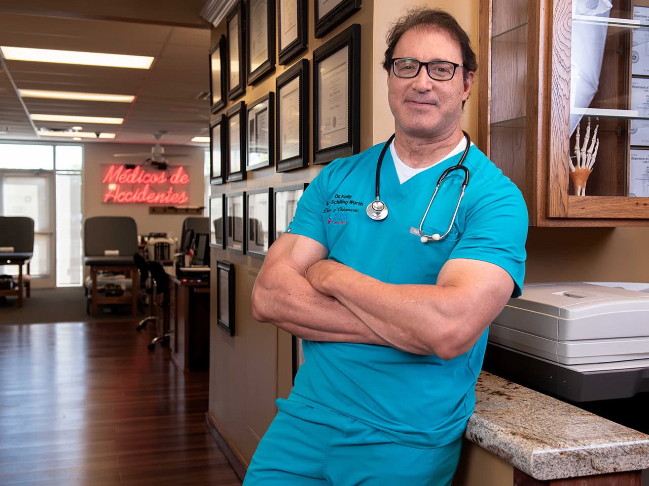 Dr kelly with green scrubs