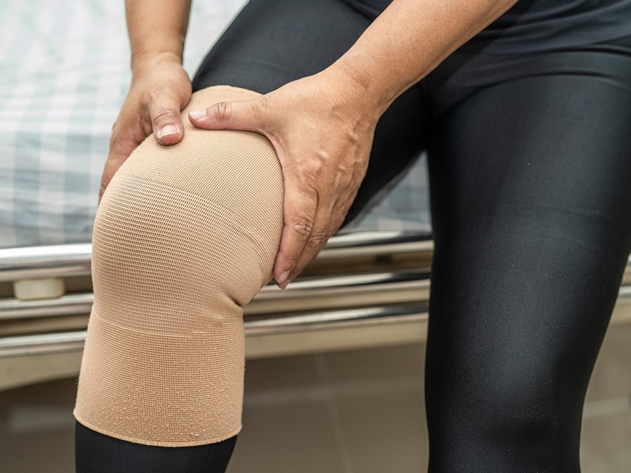 knee brace on a hispanic woman