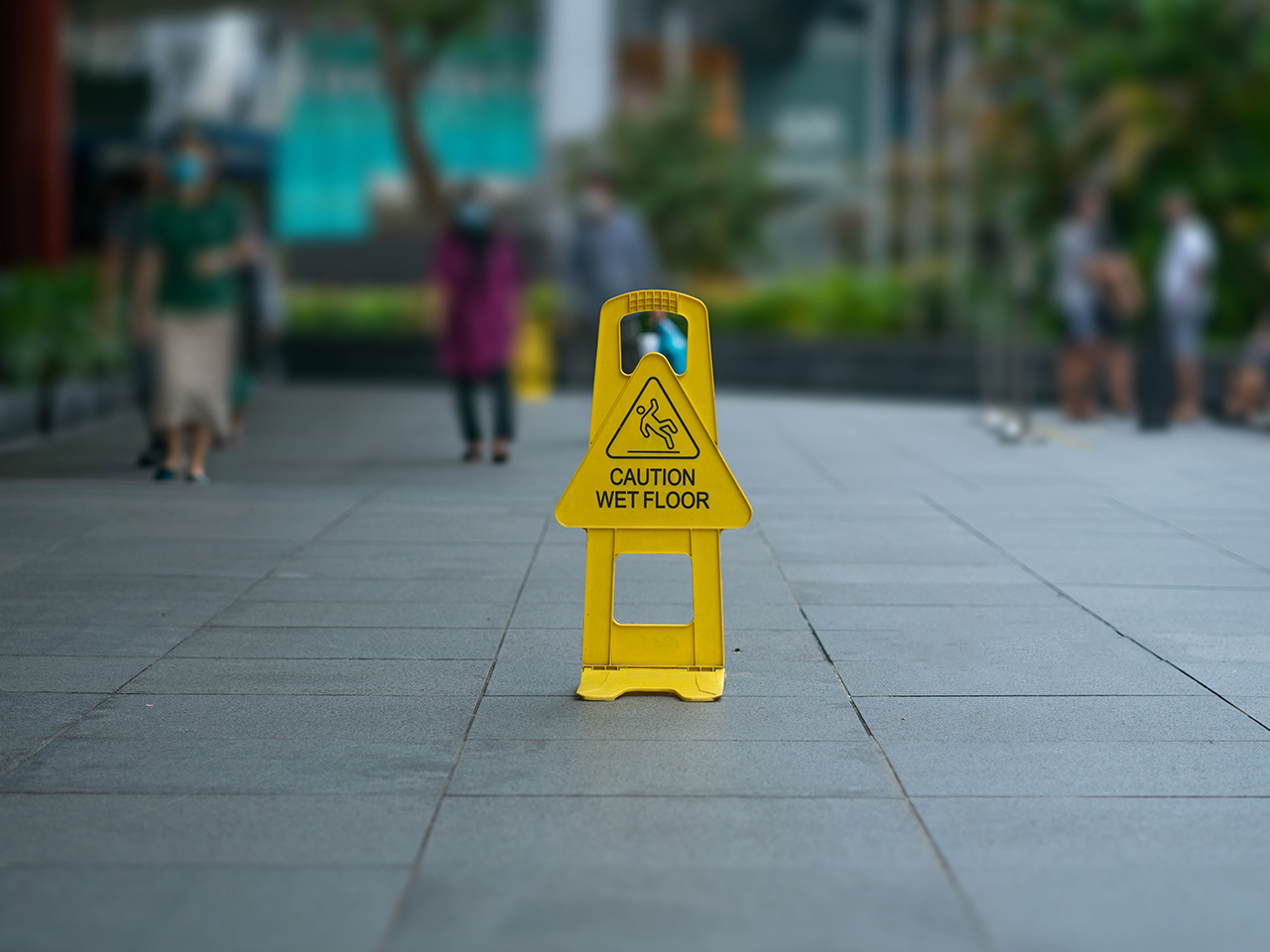 Wet floor sign in public area